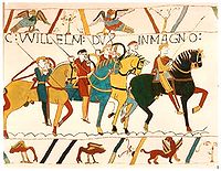 Horse riders wearing helmets and armor galloping through the midst of flying arrows.