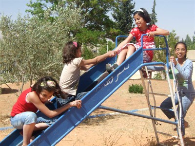 Girls on slide, CV Qodsaya, Syria